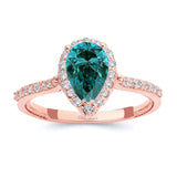 Pear Shaped Blue And White Diamond Halo Ring