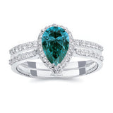 Pear Shaped Blue And White Diamond Halo Ring Set