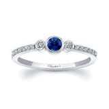 Mia Blue Sapphire three stone diamond promise ring with bezel set diamonds and elegant shank detailing.