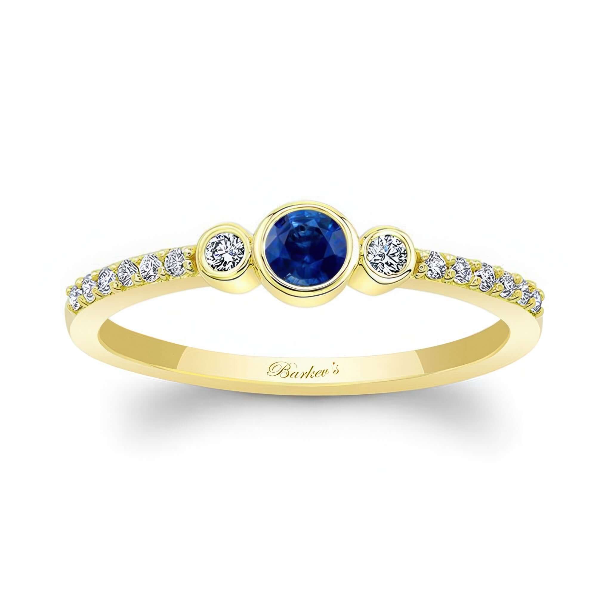 Mia Blue Sapphire Three Stone Diamond Promise Ring with yellow gold band and sparkling diamonds.