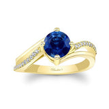 Blue Sapphire And Diamond Split Shank Engagement Ring