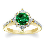 Classic Halo Emerald And Diamond Engagement Ring