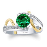 Curved Trim Emerald And Diamond Engagement Ring
