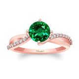 Twisted Emerald And Diamond Engagement Ring