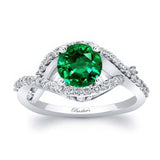 Criss Cross Emerald And Diamond Ring