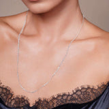 Model wearing a 9.8 Carat Floating Lab Diamond Necklace with elegant lace detailing.