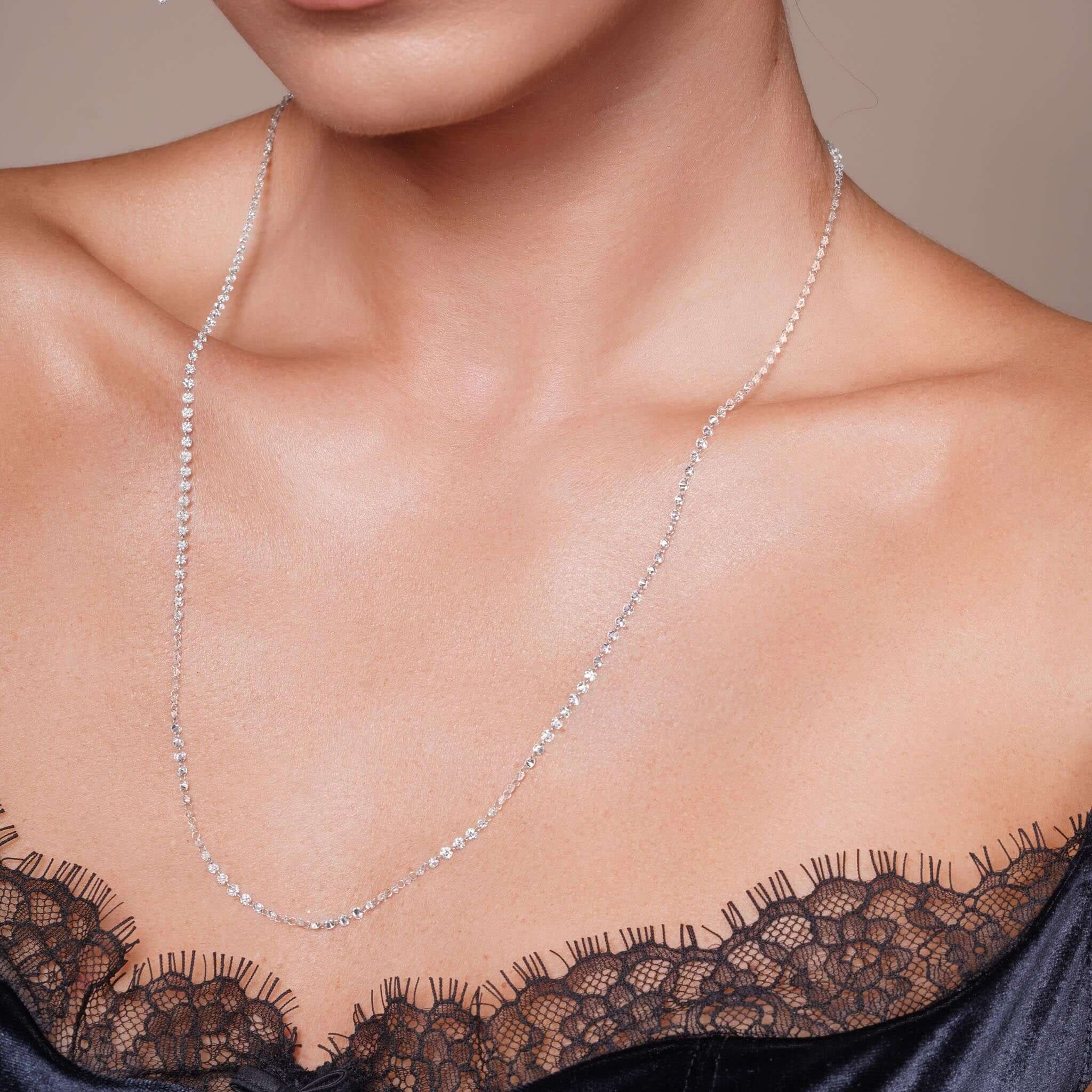Model wearing a 9.8 Carat Floating Lab Diamond Necklace with elegant lace detailing.