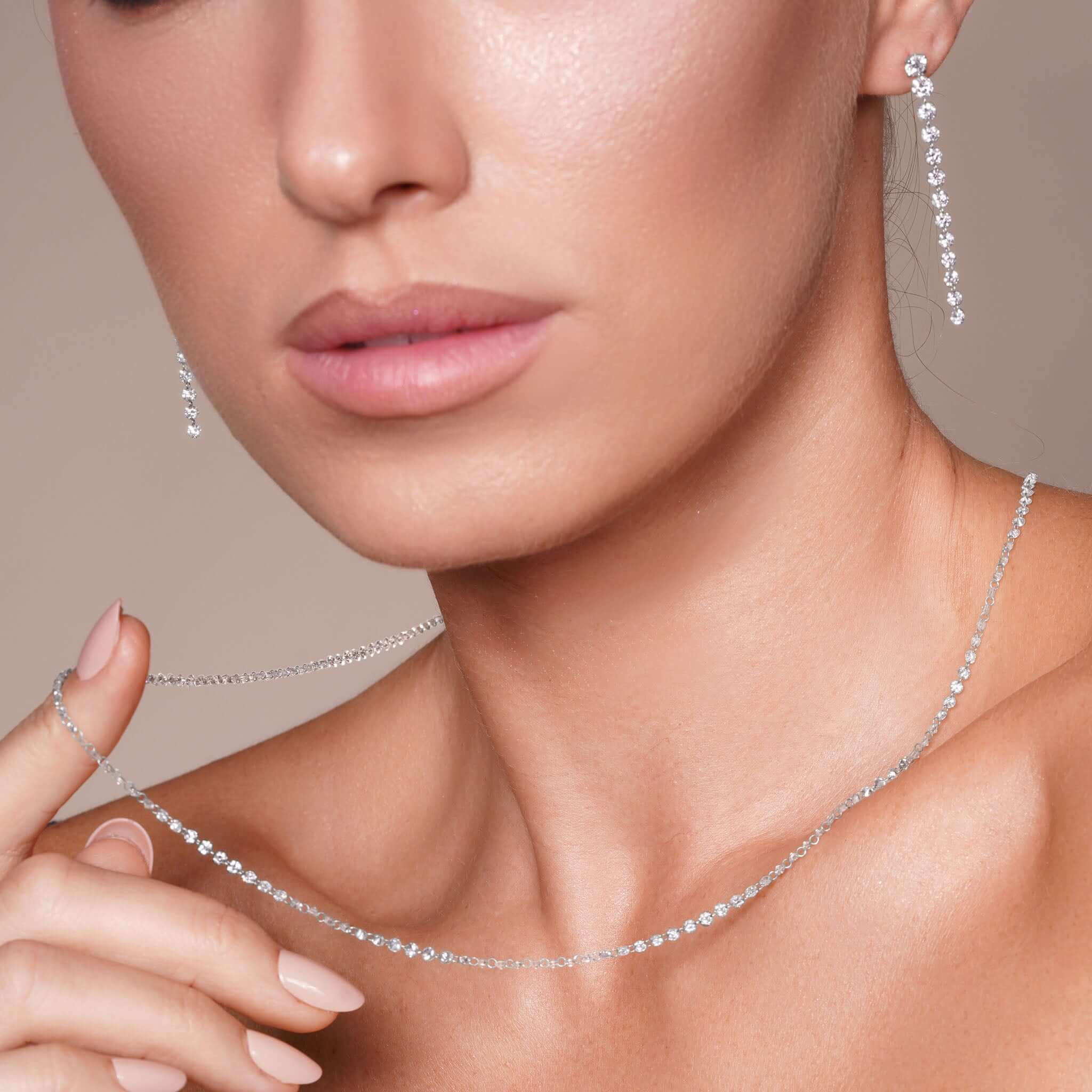 Close-up of a woman wearing a 9.8 Carat Floating Lab Diamond Necklace with sparkling lab-created diamonds.