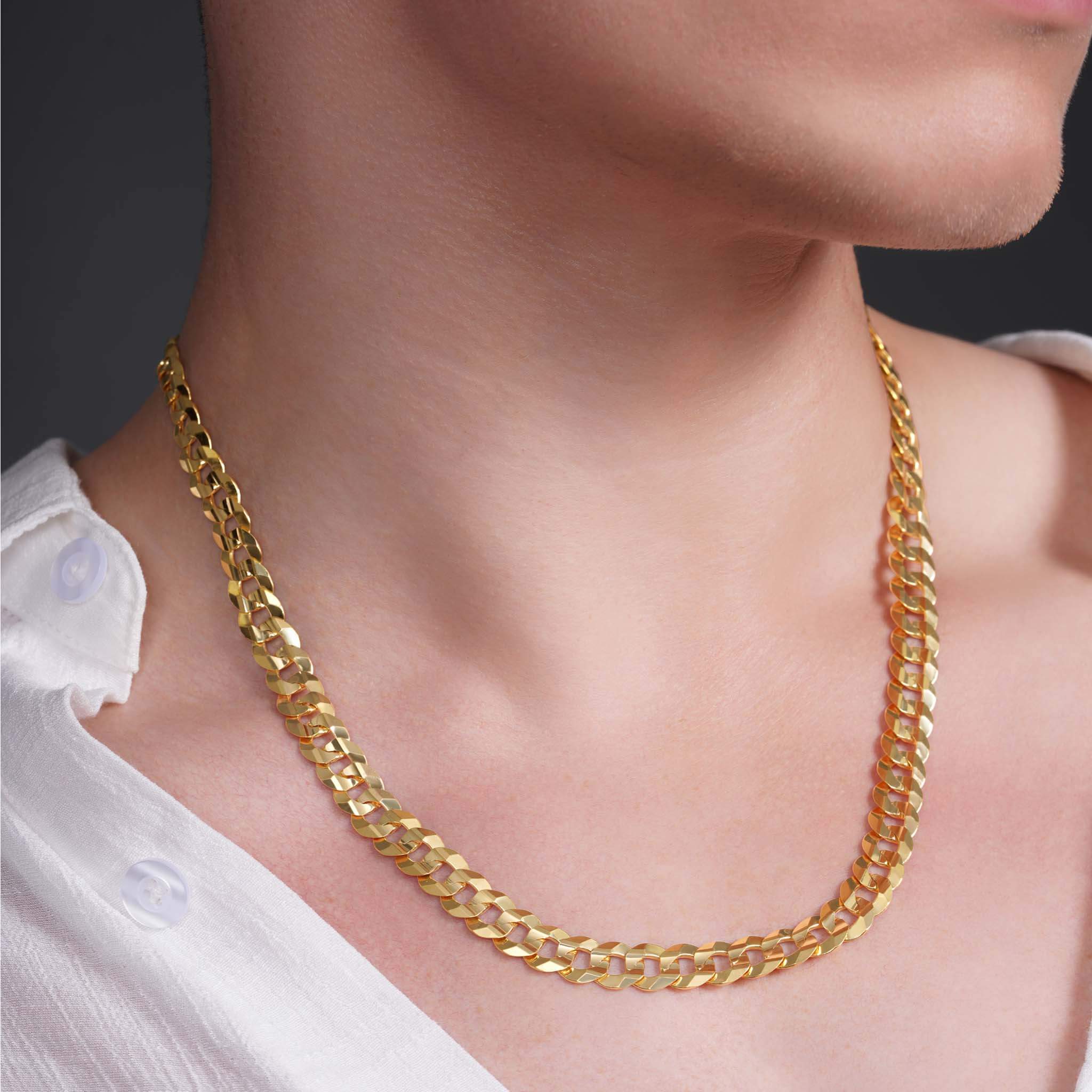 Men's Solid Gold Curb Chain shown on a model, highlighting stylish design and 14k yellow gold craftsmanship.