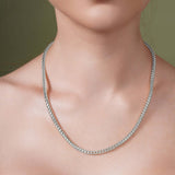 Diamond Cut Franco Chain displayed on a model's neck, showcasing its shine and elegant design.