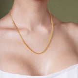 Diamond Cut Franco Chain displayed elegantly on a model's neck, showcasing its sparkling gold links.