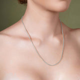 Franco Gold Chain showcased on model, featuring sleek interlocking links in 14k gold.