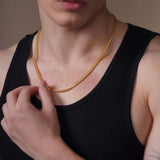 Men's Franco Gold Chain worn by a model, showcasing its sleek design in solid yellow gold.