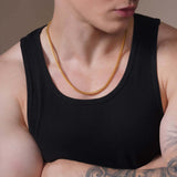 Close-up of a man wearing a Men's Franco Gold Chain, showcasing its sleek design and bold style.