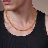 Men's Franco Gold Chain displayed on a model, showcasing its strong and sleek design in 14k solid gold.