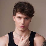 Men's Diamond Cut Franco Gold Chain worn by model with short hair and black tank top.