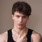 Men's Diamond Cut Franco Gold Chain worn by a model, showcasing its sleek design and elegance.