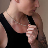 Man wearing a Men's Open Franco Gold Chain, showcasing its elegant design and polished finish.