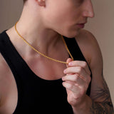 Men's Open Franco Gold Chain worn by a man in a black tank top, showcasing its elegance and polished finish.