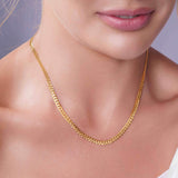 Vermeil Curb Chain worn elegantly, showcasing its gold luster and classic curb link design.