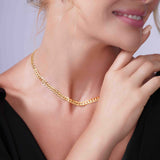 Model showcasing a Vermeil Curb Chain necklace, emphasizing its elegant design and shiny gold finish.