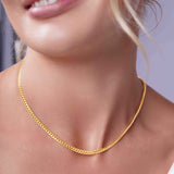 Vermeil Miami Cuban Chain showcased on a model, highlighting its luxurious design and golden sheen.