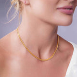 Model wearing the Vermeil Miami Cuban Chain, showcasing its lustrous gold plating and elegant design.