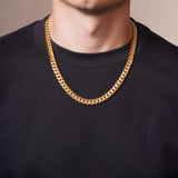 Men's Vermeil Miami Cuban Chain in 18k gold vermeil worn by a man, showcasing its classic Cuban link design.