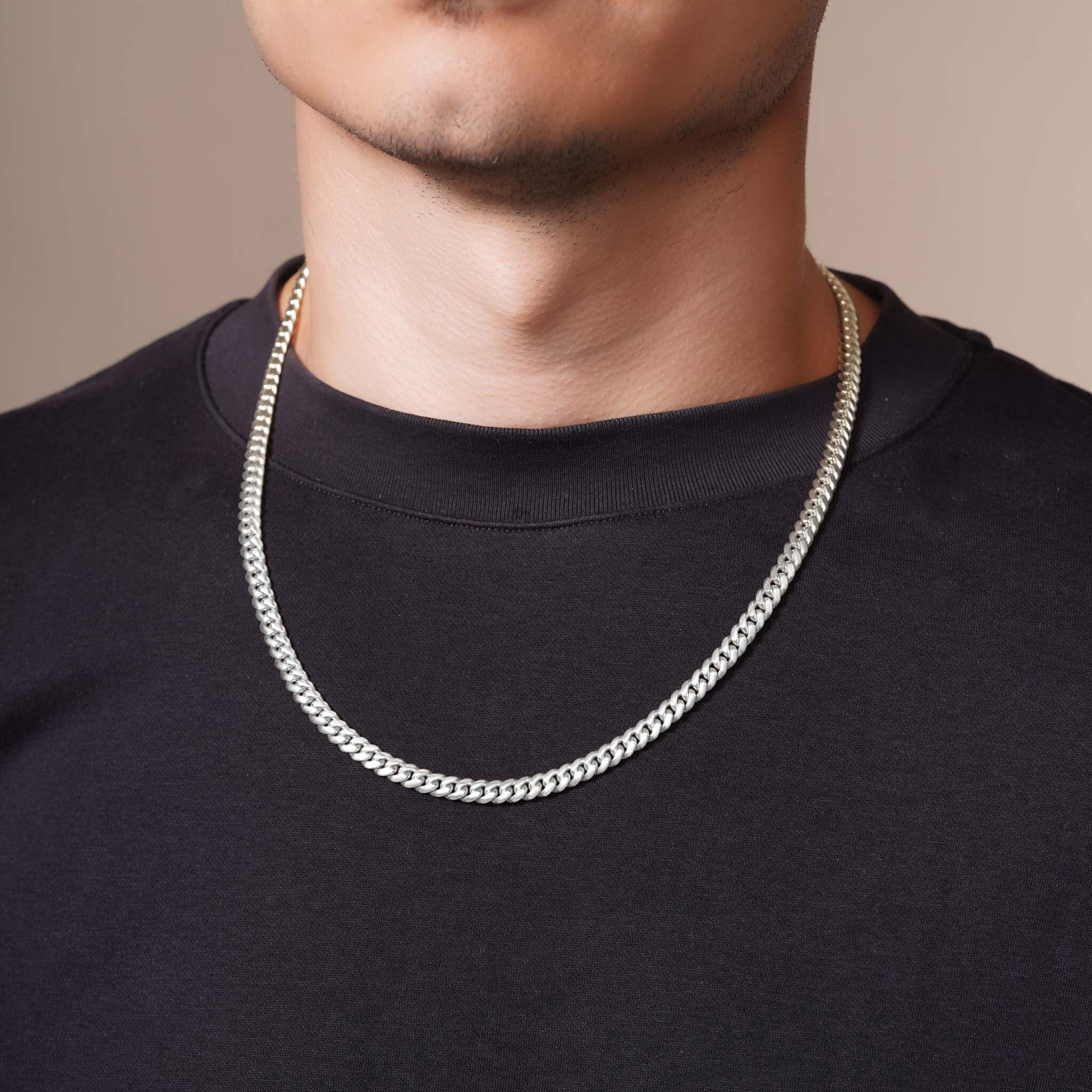 Men's Silver Miami Cuban Chain worn by a model, highlighting its durability and sleek finish.