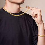 Men's Vermeil Miami Cuban Chain worn by a model, showcasing its luxurious 18k gold vermeil design.