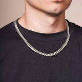 Men's Silver Miami Cuban Chain worn by a man, showcasing a sleek silver finish and durable design.