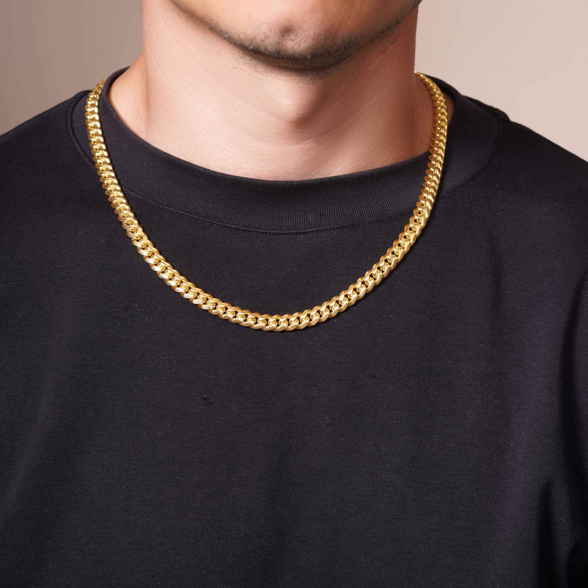 Men's Vermeil Miami Cuban Chain worn by a man, showcasing its luxurious 18k gold vermeil craftsmanship.