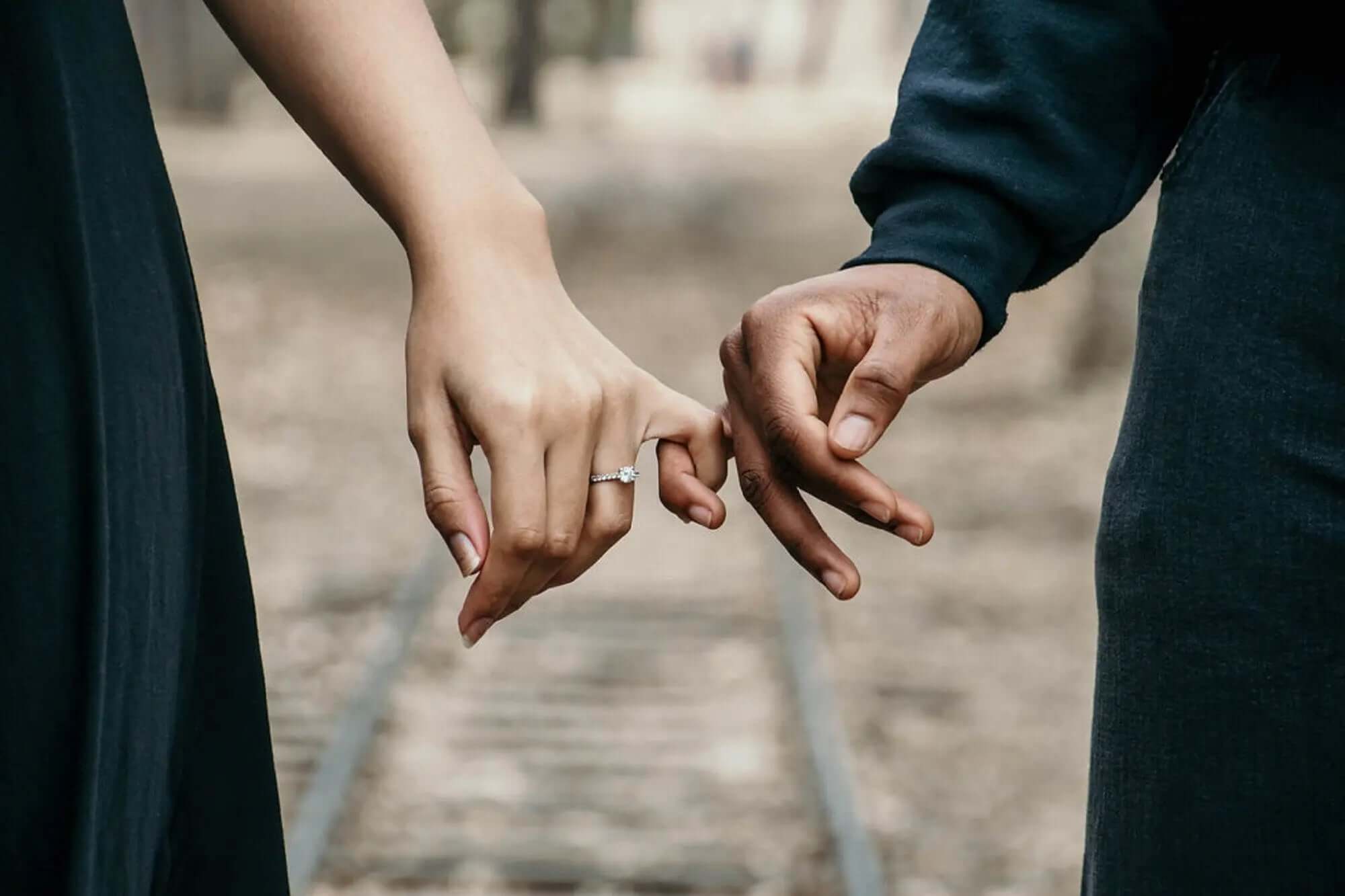a couple pinky promising