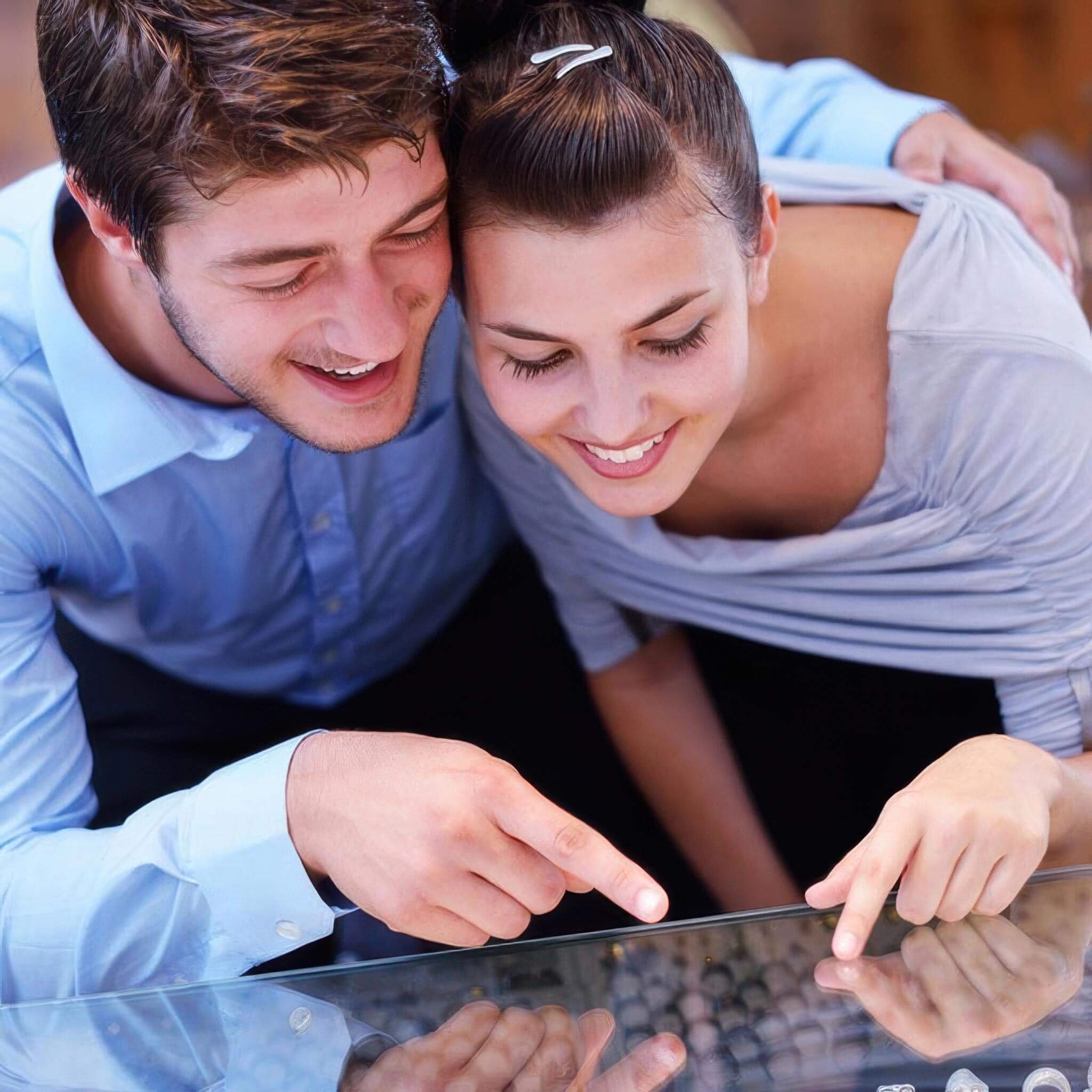 Couple shopping for an engagement ring
