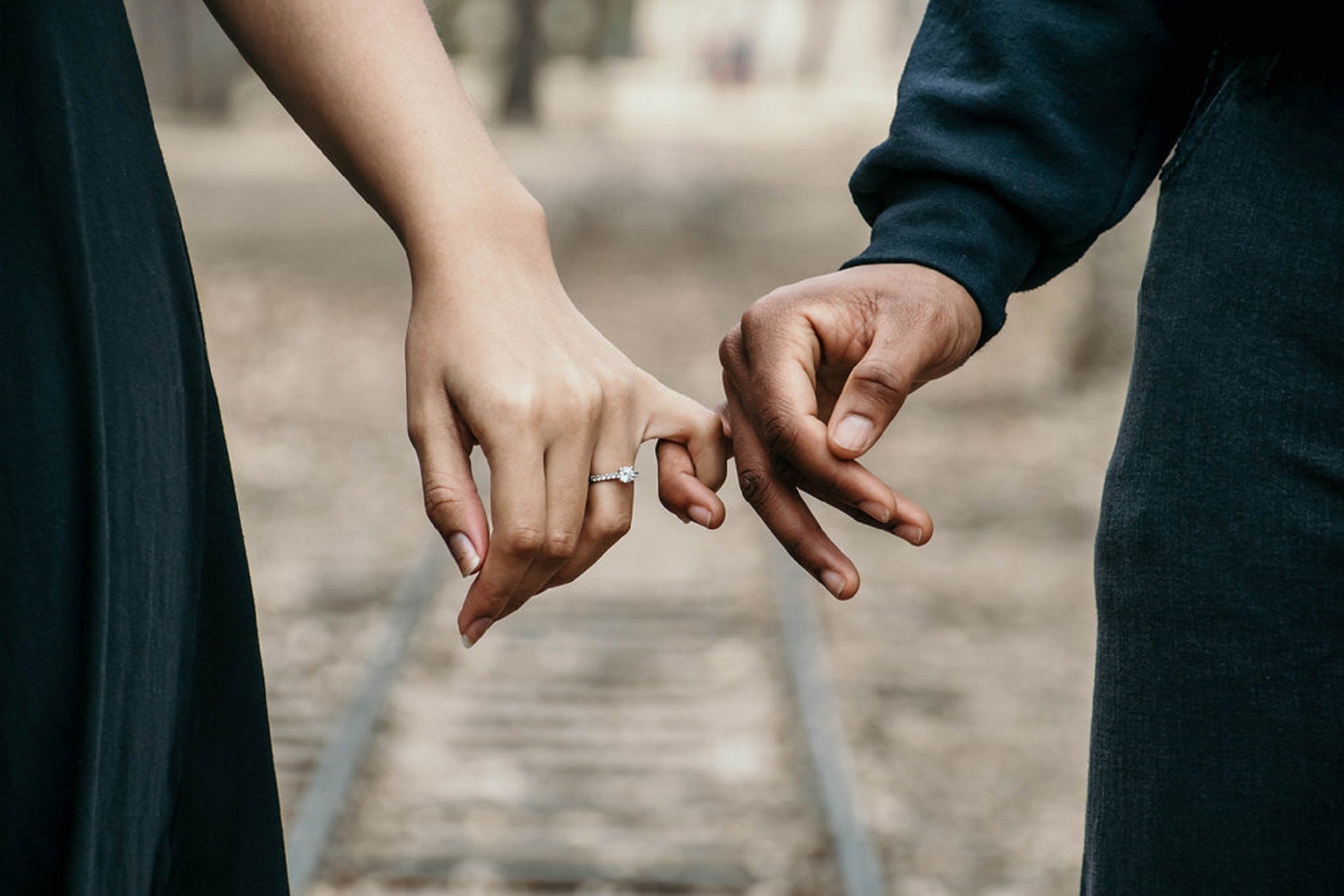 a couple pinky promising