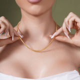 Diamond Cut Franco Vermeil Gold Chain worn by a model, showcasing its elegant design and sparkle.