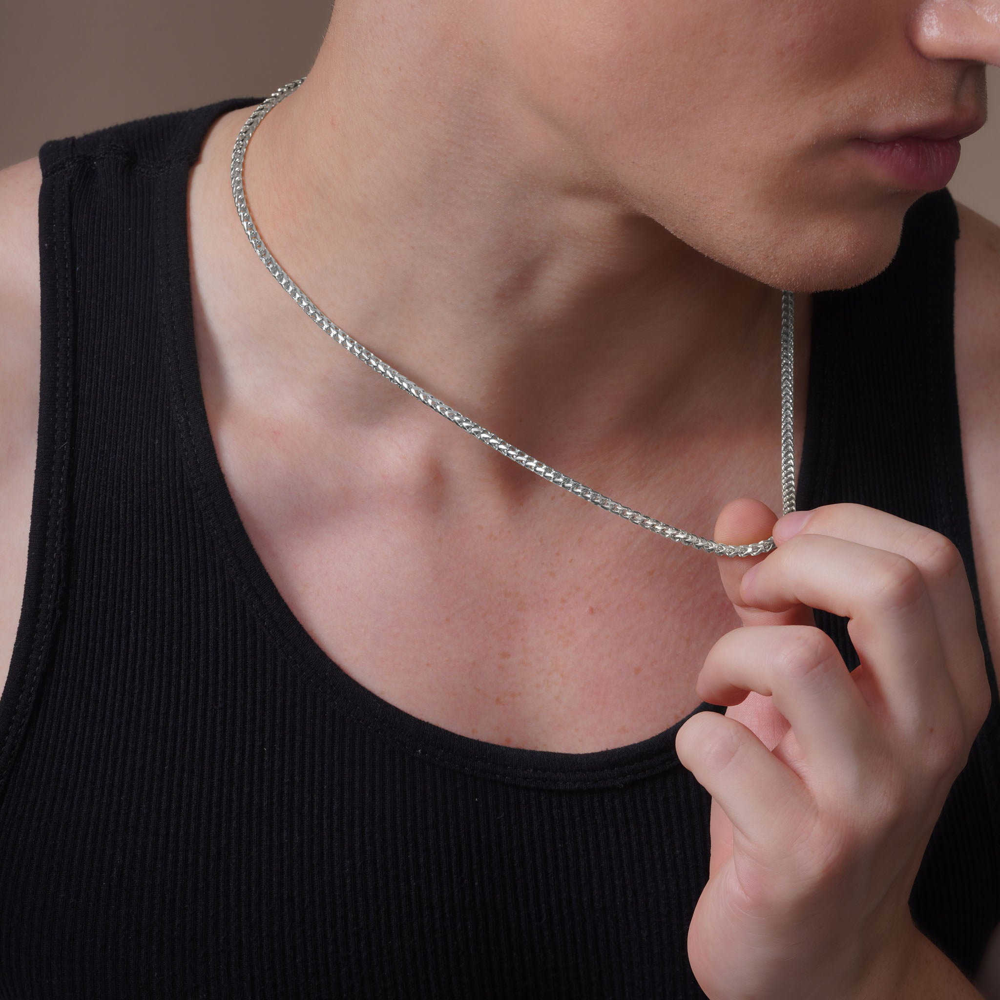 Men's Franco Silver Chain worn by a model, showcasing its style and polished finish.