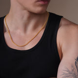 Men's Franco 18K Gold Vermeil Chain worn by a man in a black tank top, showcasing its luxurious design.