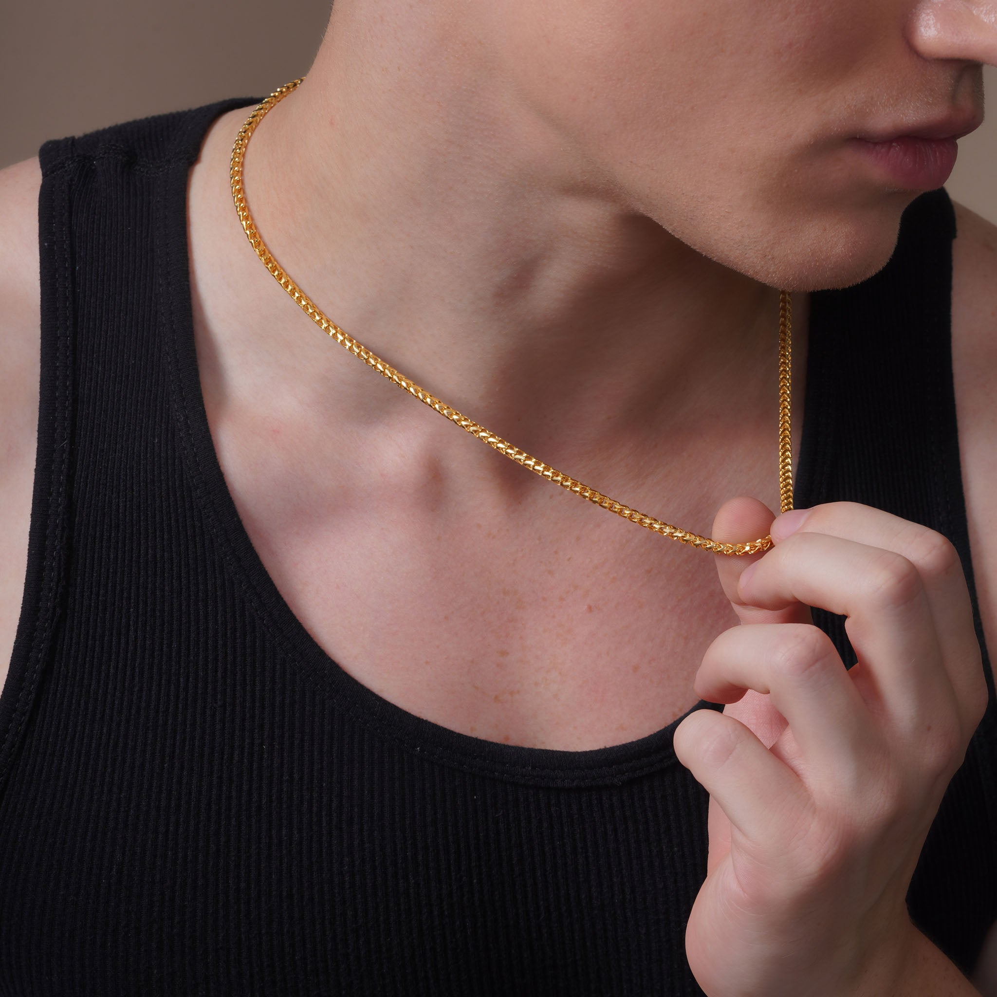 Model showcasing Men's Franco 18K Gold Vermeil Chain, highlighting its elegance and luxury.