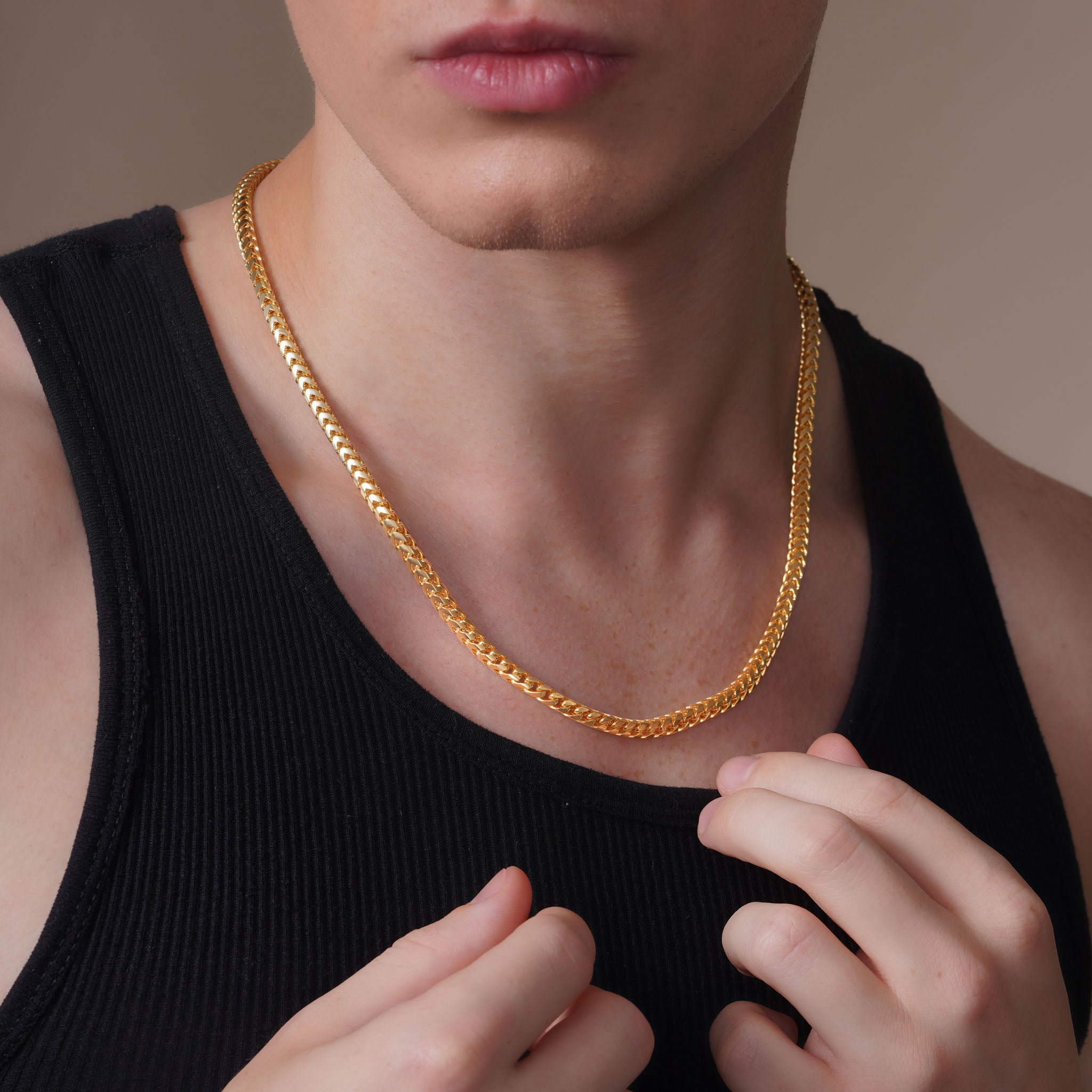 Men's Franco 18K Gold Vermeil Chain displayed on a model, showcasing its luxurious design and elegance.
