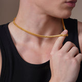 Close-up of a man modeling the Men's Franco 18K Gold Vermeil Chain, showcasing its stylish design and luxury feel.