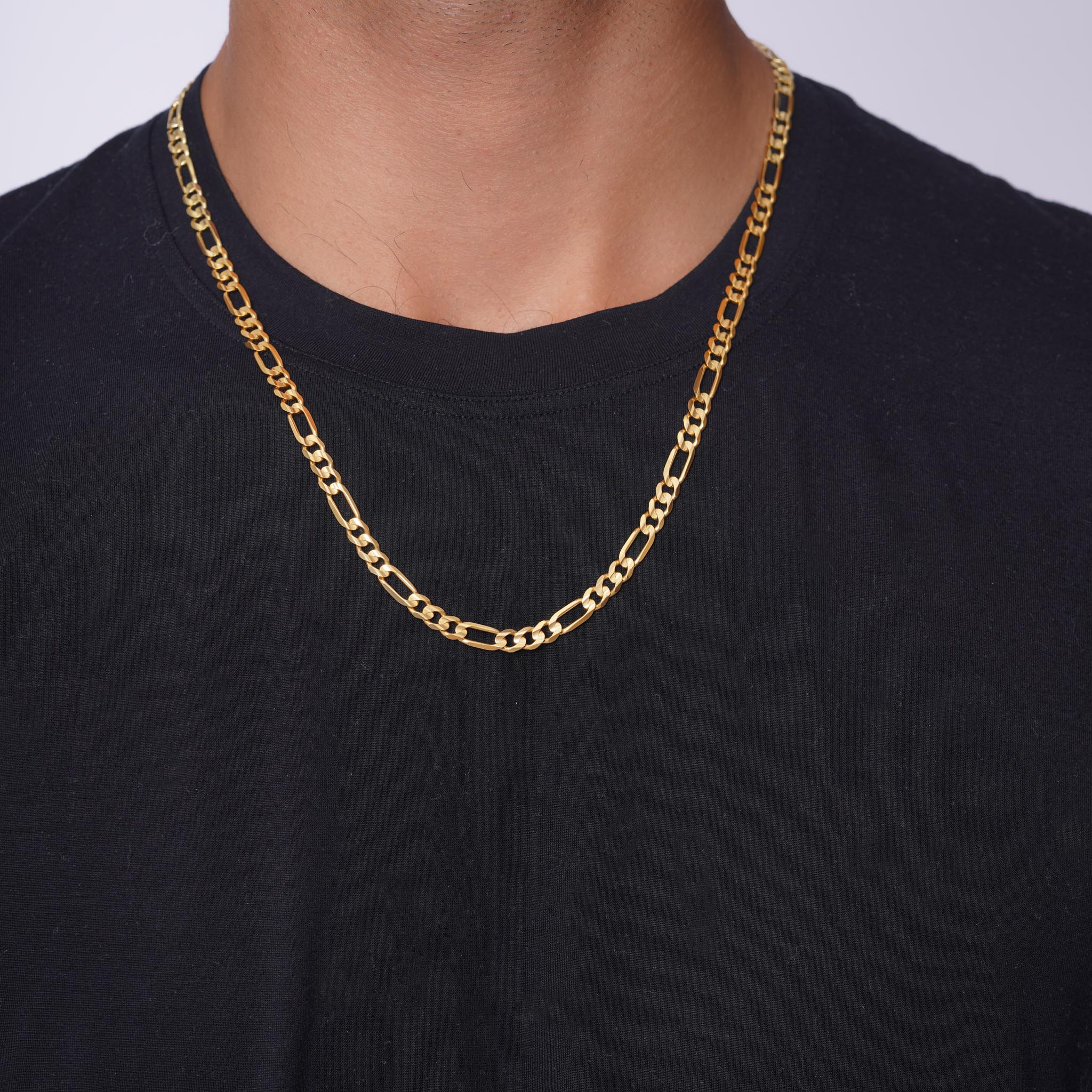 Men's Figaro Vermeil Gold Chain displayed on a model, showcasing its elegant design and durability.