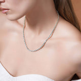 Model wearing a Sterling Silver Rope Chain Necklace, showcasing its shine and unique texture.