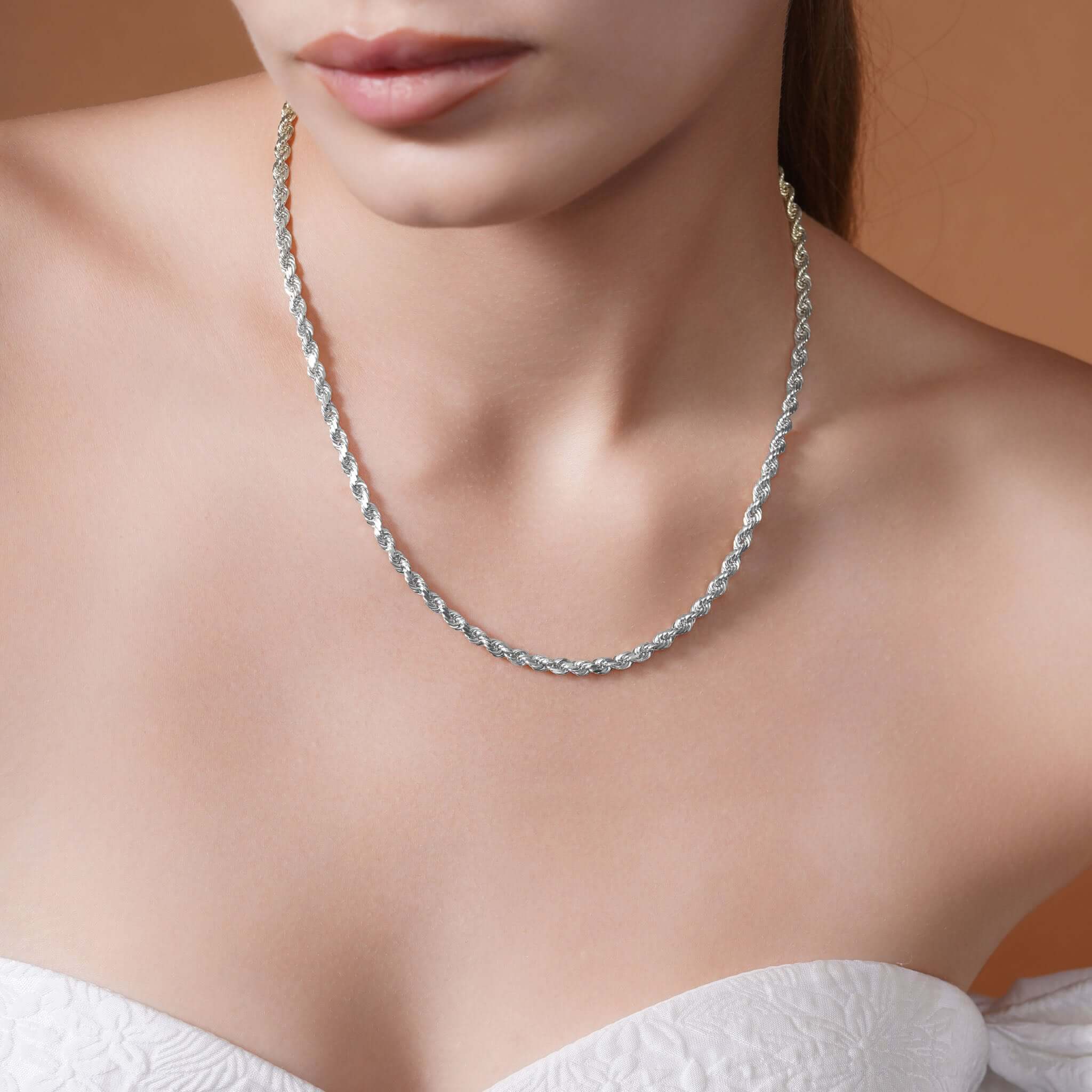 Sterling Silver Rope Chain Necklace worn by a model, showcasing its textured shine and elegant design.