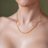 Model wearing an 18K Gold Vermeil Franco Chain, showcasing its elegance and refined craftsmanship.