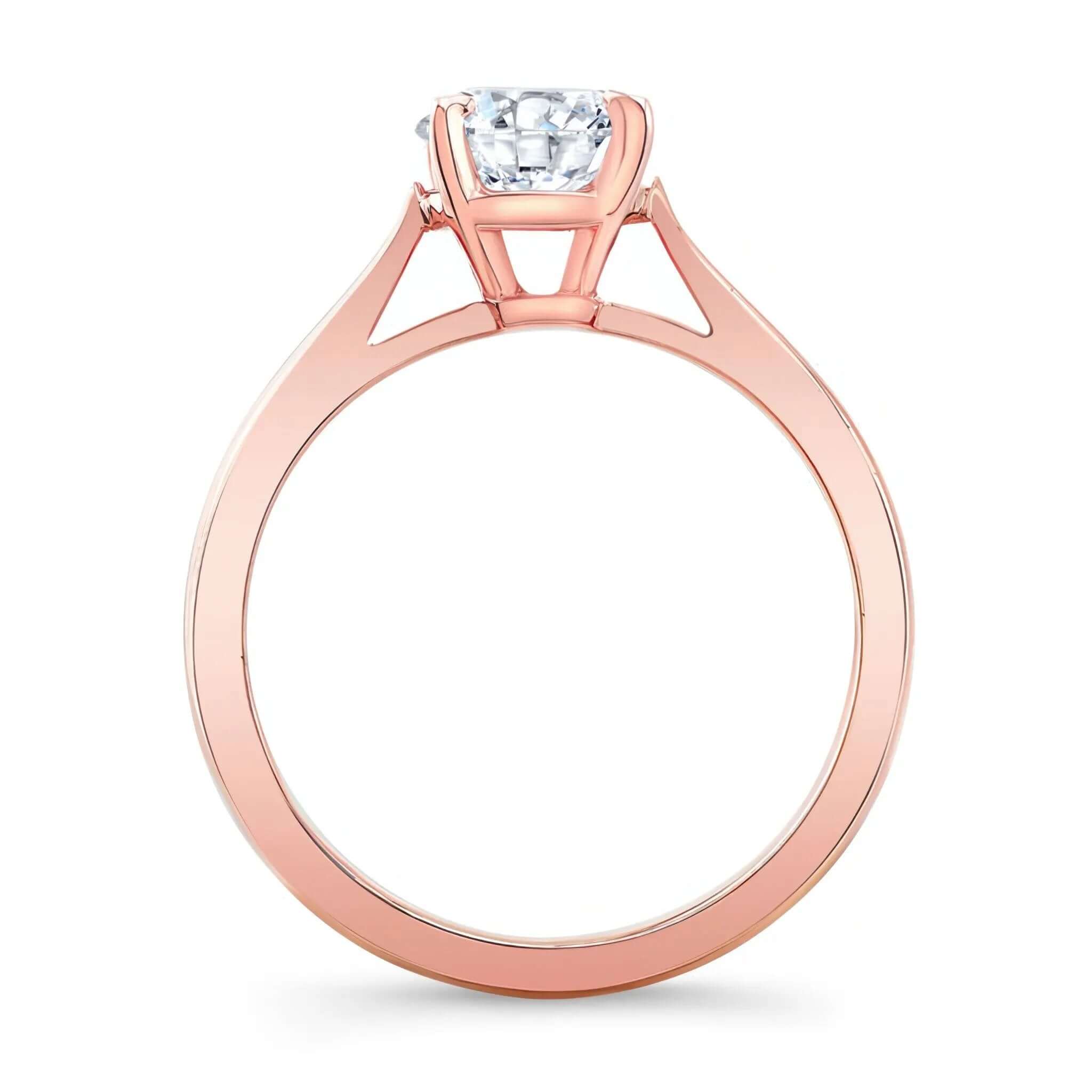 Round Moissanite Solitaire Engagement Ring featuring a delicate rose gold shank and a sparkling center stone.