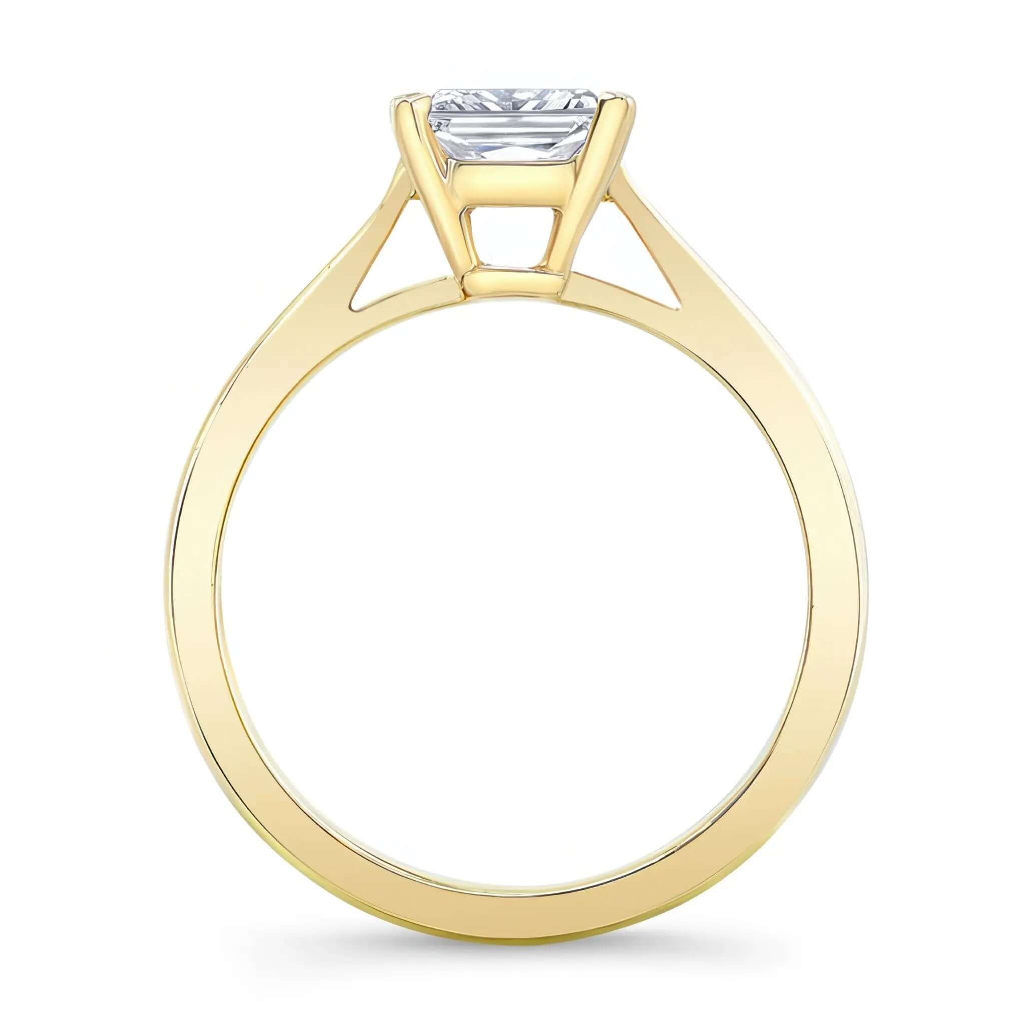 Princess cut lab grown diamond solitaire ring with yellow gold band and prong setting, elegant design.