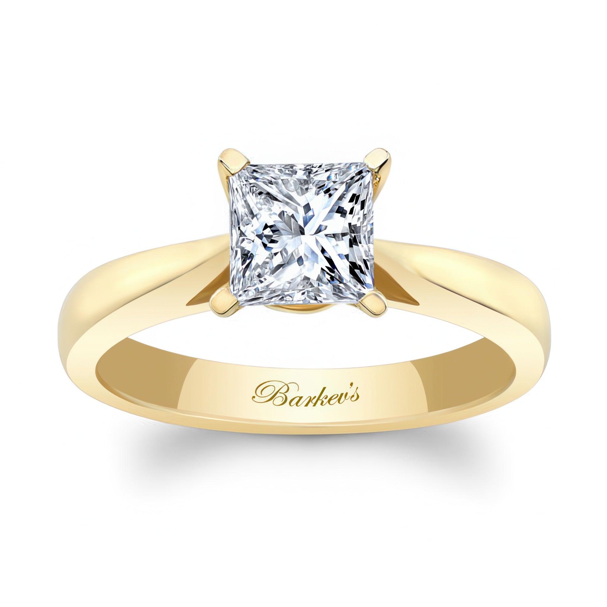 Princess cut lab grown diamond solitaire ring in yellow gold setting, elegant and timeless design.