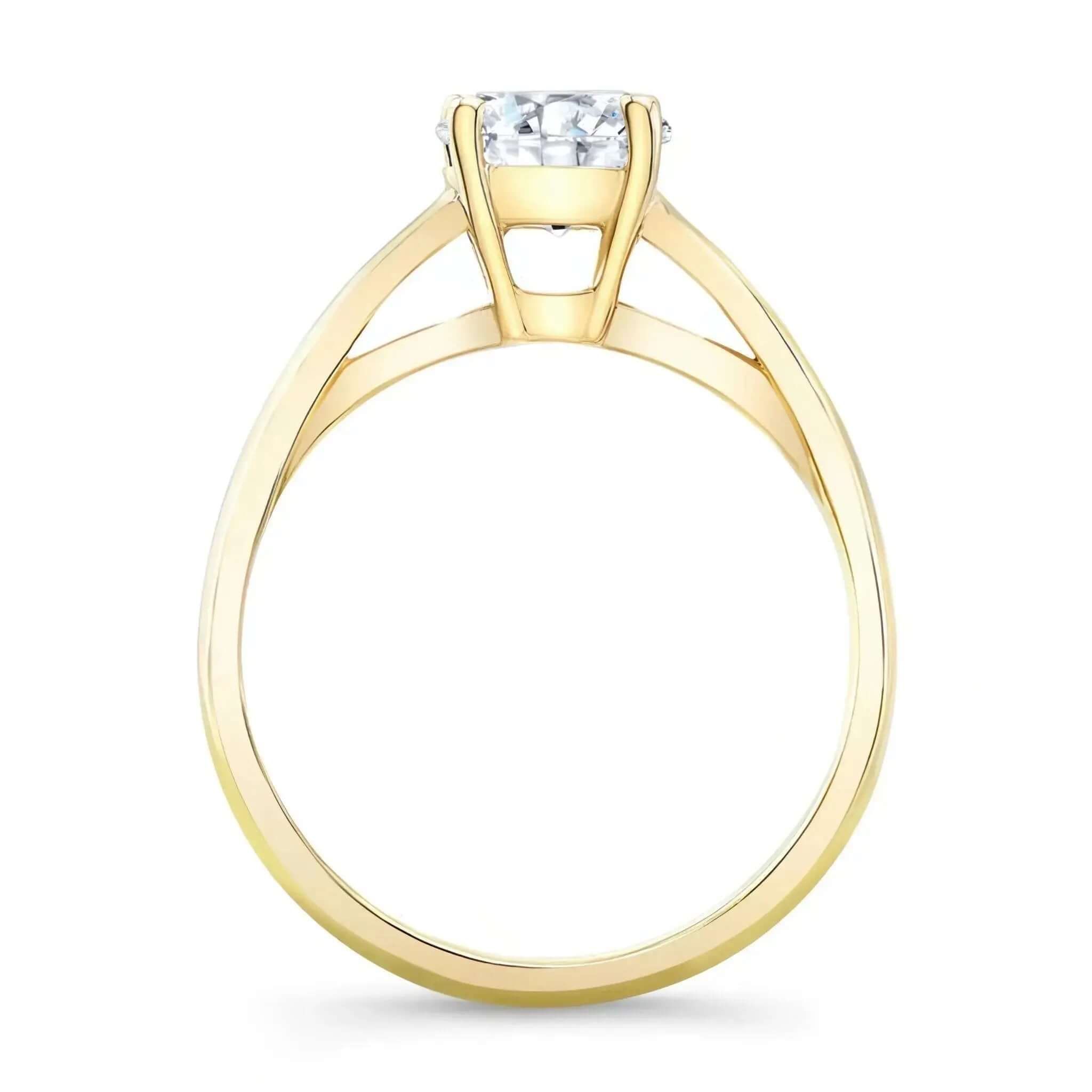 Round Moissanite Solitaire Ring showcasing a brilliant center stone and supportive basket setting.