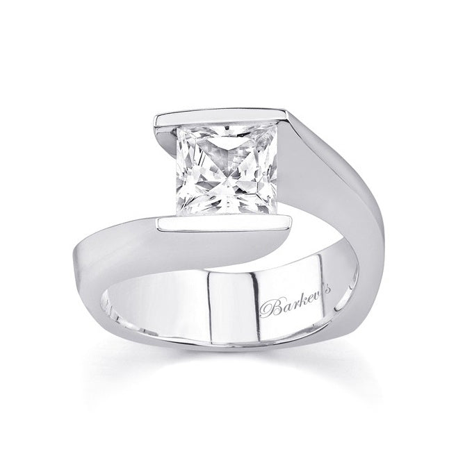White Gold tension set ring with a large diamond on a white background